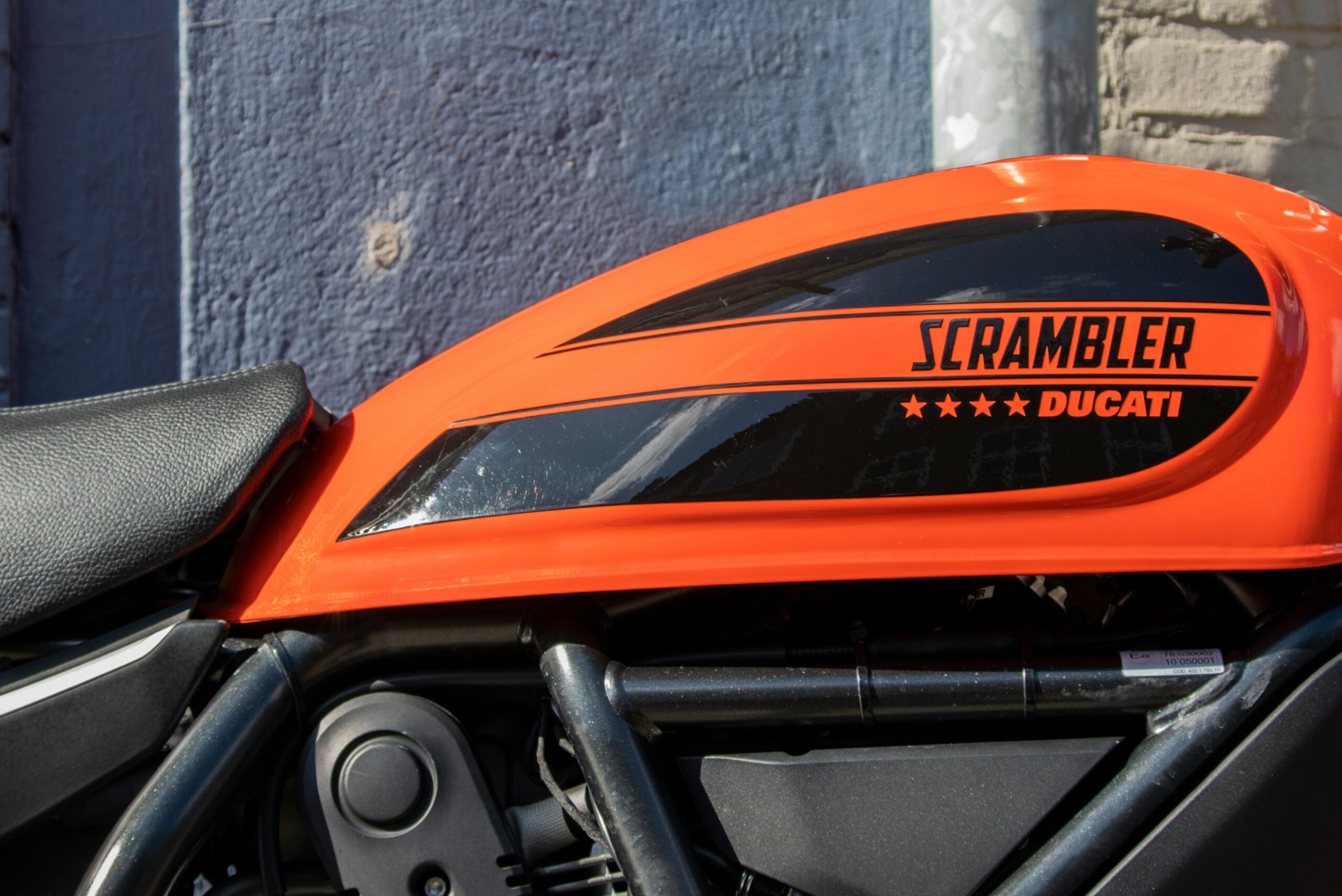 orange and black honda motorcycle