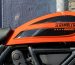 orange and black honda motorcycle
